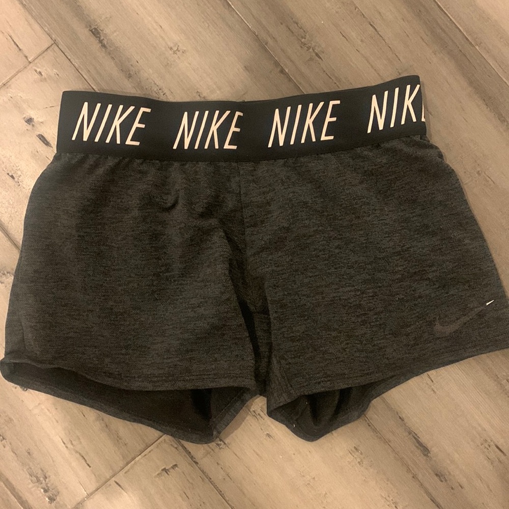 Shorts , dark grey, worn. (Runs small)